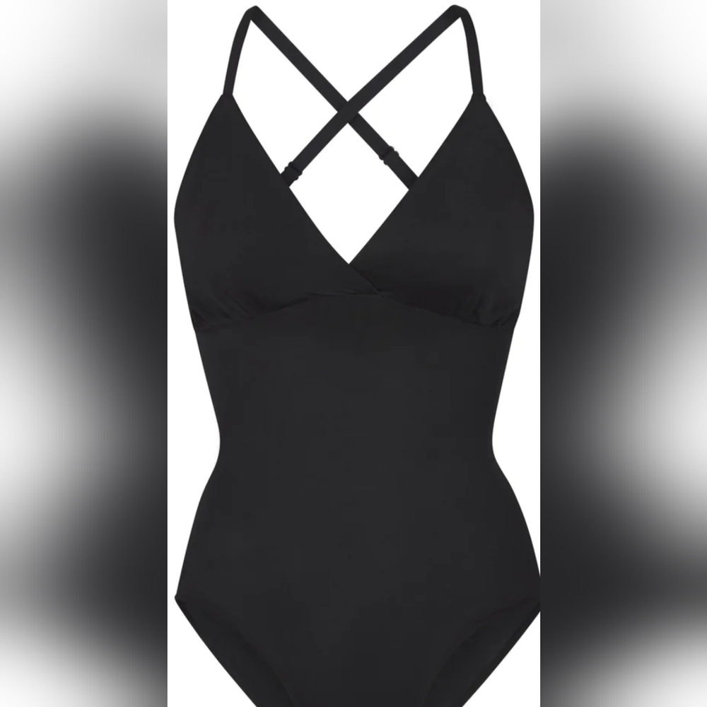 Barely there bodysuit brief with snaps.